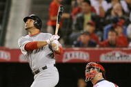 ANAHEIM, CA - OCTOBER 09: Alex Gonzalez #2 of the Boston Red Sox flys out in the third inning of Game Two of the ALDS against the Los Angeles Angels of Anaheim during the 2009 MLB Playoffs at Angel Stadium on October 9, 2009 in Anaheim, California. (Photo by Lisa Blumenfeld/Getty Images)