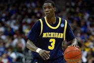 KANSAS CITY, MO - MARCH 21:  Manny Harris #3 of the Michigan Wolverines dribbles the ball against the Oklahoma Sooners during the second round of the NCAA Division I Men's Basketball Tournament at the Sprint Center on March 21, 2009 in Kansas City, Missouri. The Sooners defeated the Wolverines 73-63.  (Photo by Jamie Squire/Getty Images)