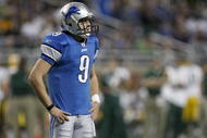 DETROIT , MI - NOVEMBER 26: Matthew Stafford #9 of the Detroit Lions looks on while playing the Green Bay Packers on November 26, 2009 at Ford Field in Detroit, Michigan. (Photo by Gregory Shamus/Getty Images)