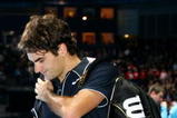 LONDON, ENGLAND - NOVEMBER 26:  Roger Federer of Switzerland leaves after his men's singles round robin match against Juan Martin Del Potro of Argentina during the Barclays ATP World Tour Finals at the O2 Arena on November 26, 2009 in London, England  (Photo by Matthew Lewis/Getty Images for Barclays ATP Finals)