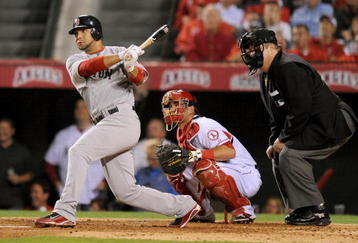 ANAHEIM, CA - OCTOBER 08:  Alex Gonzalez #3 of the Boston Red Sox singles against the Los Angeles Angels of Anaheim in the third inning of Game One of the ALDS during the 2009 MLB Playoffs at Angel Stadium on October 8, 2009 in Anaheim, California.  (Photo by Lisa Blumenfeld/Getty Images)