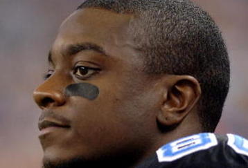 Detroit Lions wide receiver Charles Rogers watches play during  a Thanksgiving Day game, November 24, 2005, at Ford Field, Detroit.  The Atlanta Falcons defeated the Lions 27 - 7.  (Photo by Al Messerschmidt/Getty Images)