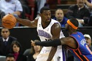 SACRAMENTO, CA - NOVEMBER 25:  Larry Hughes #0 of the New York Knicks defends against Tyreke Evans #13 of the Sacramento Kings on November 25, 2009 at ARCO Arena in Sacramento, California. NOTE TO USER: User expressly acknowledges and agrees that, by downloading and/or using this Photograph, user is consenting to the terms and conditions of the Getty Images License Agreement. (Photo by Jed Jacobsohn/Getty Images)