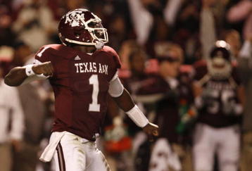 COLLEGE STATION, TX - NOVEMBER 26: Quarterback Jerrod Johnson #1 of the Texas A&M Aggies celebrates after throwing a touchdown pass against the Texas Longhorns in the first half at Kyle Field on November 26, 2009 in College Station, Texas. (Photo by Aaron M. Sprecher/Getty Images)