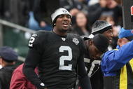 OAKLAND, CA - NOVEMBER 22:  JaMarcus Russell #2 of the Oakland Raiders looks on from the bench against the Cincinnati Bengals during an NFL game at Oakland-Alameda County Coliseum on November 22, 2009 in Oakland, California.  (Photo by Jed Jacobsohn/Getty Images)