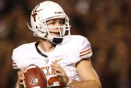 COLLEGE STATION, TX - NOVEMBER 26: Quarterback Colt McCoy #12 of the Texas Longhorns looks to pass the ball downfield against the Texas A&M Aggies in the second half at Kyle Field on November 26, 2009 in College Station, Texas. The Longhorns defeated the Aggies 49-39. (Photo by Aaron M. Sprecher/Getty Images)