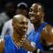 CHARLOTTE, NC - NOVEMBER 10:  Teammates Vince Carter #15 and Dwight Howard #12 of the Orlando Magic smile as they look over at the bench against the Charlotte Bobcats during their game at Time Warner Cable Arena on November 10, 2009 in Charlotte, North Carolina.  (Photo by Streeter Lecka/Getty Images)