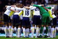 LONDON, ENGLAND - NOVEMBER 22:  Tottenham Hotspur huddle prior to the Barclays Premier League match between Tottenham Hotspur and Wigan Athletic at White Hart Lane on November 22, 2009 in London, England.  (Photo by Clive Rose/Getty Images)