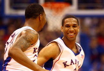 LAWRENCE, KS - NOVEMBER 25:  Xavier Henry #1 of the Kansas Jayhawks celebrates with Marcus Morris #22 after scoring during the game against the Oakland Golden Grizzlies on November 25, 2009 at Allen Fieldhouse in Lawrence, Kansas.  (Photo by Jamie Squire/Getty Images)