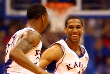 LAWRENCE, KS - NOVEMBER 25:  Xavier Henry #1 of the Kansas Jayhawks celebrates with Marcus Morris #22 after scoring during the game against the Oakland Golden Grizzlies on November 25, 2009 at Allen Fieldhouse in Lawrence, Kansas.  (Photo by Jamie Squire/Getty Images)