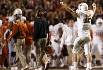 COLLEGE STATION, TX - NOVEMBER 26: Quarterback Colt McCoy #12 of the Texas Longhorns celebrates against the Texas A&M Aggies in the second half at Kyle Field on November 26, 2009 in College Station, Texas. The Longhorns defeated the Aggies 49-39.(Photo by Aaron M. Sprecher/Getty Images)