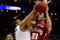 KANSAS CITY, MO - MARCH 21:  Pierre Henderson-Niles #4 of the Memphis Tigers defends a shot attempt by Greivis Vasquez #21 of the Maryland Terrapins in the first half during the second round of the NCAA Division I Men's Basketball Tournament at the Sprint Center on March 21, 2009 in Kansas City, Missouri.  (Photo by Jamie Squire/Getty Images)