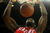 OAKLAND, CA - NOVEMBER 20:  Greg Oden #52 of the Portland Trail Blazers dunks against the Golden State Warriors during an NBA game at Oracle Arena on November 20, 2009 in Oakland, California.  (Photo by Jed Jacobsohn/Getty Images)