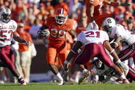 CLEMSON, SC - NOVEMBER 25:  Darius Gaither #20 of the Clemson Tigers carries the ball against Emanuel Cook #21 of the South Carolina Gamecocks at Memorial Stadium on November 25, 2006 in Clemson, South Carolina. South Carolina won 31-28. (Photo by Grant Halverson/Getty Images)