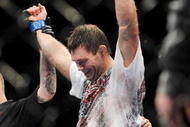 LAS VEGAS - NOVEMBER 21:  Forrest Griffin celebrates his victory over Tito Ortiz after their Light Heavyweight Fight at the UFC 106 at Mandalay Bay Events Center on November 21, 2009 in Las Vegas, Nevada.  (Photo by Jon Kopaloff/Getty Images)