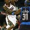 MILWAUKEE - NOVEMBER 16: Brandon Jennings #3 of the Milwuakee Bucks passes the ball over Jason Terry #31 of the Dallas Mavericks at the Bradley Center on November 16, 2009 in Milwaukee, Wisconsin. (Photo by Jonathan Daniel/Getty Images)