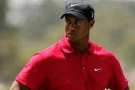 MELBOURNE, AUSTRALIA - NOVEMBER 15:  Tiger Woods of the USA prepares to play an approach shot on the 1st hole during the final round of the 2009 Australian Masters at Kingston Heath Golf Club on November 15, 2009 in Melbourne, Australia.  (Photo by Mark Dadswell/Getty Images)