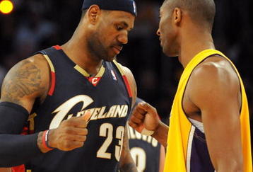 LOS ANGELES, CA - JANUARY 19:  LeBron James #23 of the Cleveland Cavaliers greets Kobe Bryant #24 of the Los Angeles Lakers after Kobe injures his hand during the first quarter at Staples Center on January 19, 2009 in Los Angeles, California.  (Photo by Harry How/Getty Images)