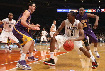 NEW YORK - NOVEMBER 25:  Stanley Robinson #21 of the Connecticut Huskies dribbles the ball against the LSU Tigers at Madison Square Garden on November 25, 2009 in New York, New York.  (Photo by Nick Laham/Getty Images)