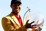 MELBOURNE, AUSTRALIA - NOVEMBER 15:  Tiger Woods of the USA poses with the trophy after the final round of the 2009 Australian Masters at Kingston Heath Golf Club on November 15, 2009 in Melbourne, Australia.  (Photo by Quinn Rooney/Getty Images)