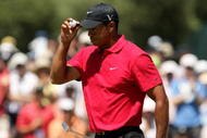 MELBOURNE, AUSTRALIA - NOVEMBER 15: Tiger Woods of the USA acknowledges the crowd on the 9th hole during the final round of the 2009 Australian Masters at Kingston Heath Golf Club on November 15, 2009 in Melbourne, Australia. (Photo by Mark Dadswell/Getty Images)
