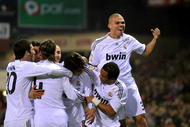 MADRID, SPAIN - NOVEMBER 07: Pepe (R) of Real Madrid celebrates after Kaka (C) scored Real's first goal during the La Liga match between Atletico Madrid and Real Madrid at the Vicente Calderon Stadium on November 7, 2009 in Madrid, Spain. (Photo by Denis Doyle/Getty Images)