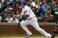 CHICAGO - AUGUST 28: Jeff Baker #28 of the Chicago Cubs hits the ball against the New York Mets on August 28, 2009 at Wrigley Field in Chicago, Illinois. The Cubs defeated the Mets 5-2. (Photo by Jonathan Daniel/Getty Images)