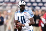 HOUSTON - NOVEMBER 23:  Quarterback Vince Young #10 of the Tennessee Titans warms up prior to a game against the Houston Texans at Reliant Stadium on November 23, 2009 in Houston, Texas.  (Photo by Bob Levey/Getty Images)