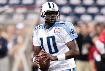 HOUSTON - NOVEMBER 23:  Quarterback Vince Young #10 of the Tennessee Titans warms up prior to a game against the Houston Texans at Reliant Stadium on November 23, 2009 in Houston, Texas.  (Photo by Bob Levey/Getty Images)