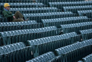 FORT COLLINS, CO - NOVEMBER 01:  A lone fan takes his seat as the Brigham Young Cougars and the Colorado State Rams take the field to warm up prior to the game at Sonny Lubick Field at Hughes Stadium on November 1, 2008 in Fort Collins, Colorado. BYU defeated CSU 45-42.  (Photo by Doug Pensinger/Getty Images)