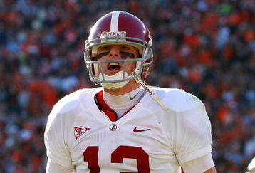 AUBURN, AL - NOVEMBER 27:  Quarterback Greg McElroy #12 of the Alabama Crimson Tide celebrates a touchdown against the Auburn Tigers at Jordan-Hare Stadium on November 27, 2009 in Auburn, Alabama.  (Photo by Kevin C. Cox/Getty Images)