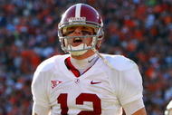 AUBURN, AL - NOVEMBER 27:  Quarterback Greg McElroy #12 of the Alabama Crimson Tide celebrates a touchdown against the Auburn Tigers at Jordan-Hare Stadium on November 27, 2009 in Auburn, Alabama.  (Photo by Kevin C. Cox/Getty Images)