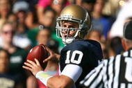 SOUTH BEND, IN - SEPTEMBER 19: Dayne Crist #10 of the Notre Dame Fighting Irish looks for a receiver against the Michigan State Spartans on September 19, 2009 at Notre Dame Stadium in South Bend, Indiana. Notre Dame defeated Michigan State 33-30. (Photo by Jonathan Daniel/Getty Images)