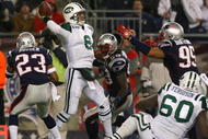 FOXBORO, MA - NOVEMBER 22:  Mark Sanchez #6 of the New York Jets feels the pressure of defense of the New England Patriots at Gillette Stadium on November 22, 2009 in Foxboro, Massachusetts. (Photo by Jim Rogash/Getty Images)