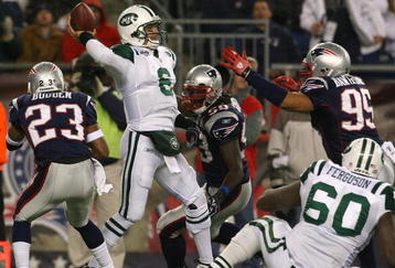 FOXBORO, MA - NOVEMBER 22:  Mark Sanchez #6 of the New York Jets feels the pressure of defense of the New England Patriots at Gillette Stadium on November 22, 2009 in Foxboro, Massachusetts. (Photo by Jim Rogash/Getty Images)