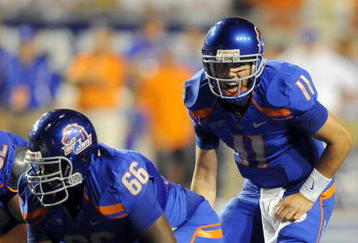BOISE, ID - SEPTEMBER 3: Quarterback Kellen Moore #6 of the Boise State Broncos barks out signals as center Thomas Byrd #66 of the Boise State Broncos waits to snap the ball in the third quarter of the game against the Oregon Ducks at Bronco Stadium on September 3, 2009 in Boise, Idaho. Boise State won the game 19-8. (Photo by Steve Dykes/Getty Images)