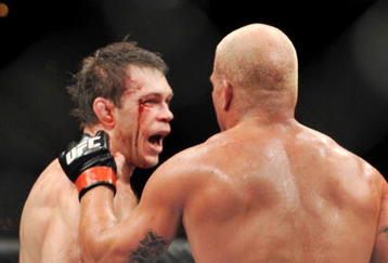 LAS VEGAS - NOVEMBER 21:  Tito Ortiz and Forrest Griffin congratulate each other after Griffin wins their Light Heavyweight Fight at the UFC 106 at Mandalay Bay Events Center on November 21, 2009 in Las Vegas, Nevada. (Photo by Jon Kopaloff/Getty Images)
