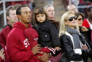 PALO ALTO, CA - NOVEMBER 21:  Honorary Standford Cardinal captain Tiger Woods his daugher, Sam, and wife, Elin Nordegren, stand on the sidelines before the Cardinal game against the California Bears at Stanford Stadium on November 21, 2009 in Palo Alto, California.  (Photo by Ezra Shaw/Getty Images)