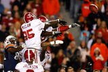 AUBURN, AL - NOVEMBER 27:  Rolando McClain #25 and Justin Woodall #27 of the Alabama Crimson Tide knock down a hail mary pass in the end zone by the Auburn Tigers at Jordan-Hare Stadium on November 27, 2009 in Auburn, Alabama.  (Photo by Kevin C. Cox/Getty Images)