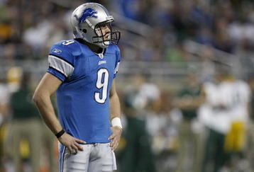 DETROIT , MI - NOVEMBER 26:  Matthew Stafford #9 of the Detroit Lions looks on while playing the Green Bay Packers on November 26, 2009 at Ford Field in Detroit, Michigan.  (Photo by Gregory Shamus/Getty Images)