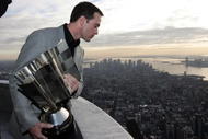 NEW YORK - NOVEMBER 24:  Jimmie Johnson 2009 NASCAR Sprint Cup Series Champion poses for a photo at the top of the Empire State Building on November 24, 2009 in New York City. Jimmie Johnson is celebrating after winning his forth consecutive NASCAR Sprint Cup Series Championship.  (Photo by Mike Stobe/Getty Images for NASCAR)