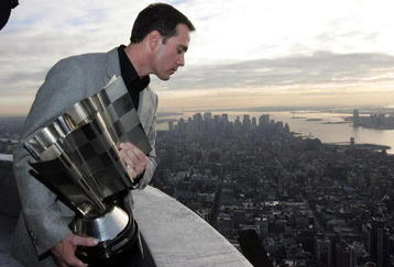 NEW YORK - NOVEMBER 24:  Jimmie Johnson 2009 NASCAR Sprint Cup Series Champion poses for a photo at the top of the Empire State Building on November 24, 2009 in New York City. Jimmie Johnson is celebrating after winning his forth consecutive NASCAR Sprint Cup Series Championship.  (Photo by Mike Stobe/Getty Images for NASCAR)