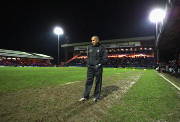 STOCKPORT, ENGLAND - NOVEMBER 27: Referee
                David Rose walks on the pitch after the abandonment of
                the Guinness Premiership match between Sale Sharks and
                London Wasps at Edgeley Park on November 27, 2009 in
                Stockport, England. (Photo by David Rogers/Getty
                Images)