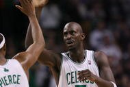 BOSTON - NOVEMBER 01:  Kevin Garnett #5 and Paul Pierce #34 of the Boston Celtics celebrate the win over the New Orleans Hornets at the TD Garden on November 1, 2009 in Boston, Massachusetts. The Celtics defeated the Hornets 97-87. NOTE TO USER: User expressly acknowledges and agrees that, by downloading and or using this photograph, User is consenting to the terms and conditions of the Getty Images License Agreement.  (Photo by Elsa/Getty Images)