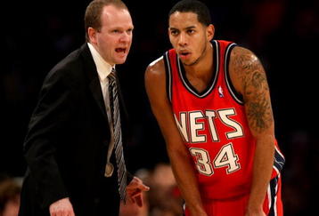 LOS ANGELES, CA - NOVEMBER 25:  Head coach Lawrence Frank and Devin Harris #34 of the New Jersey Nets confer during the game with the Los Angeles Lakers on November 25, 2008 at Staples Center in Los Angeles, California. The Lakers won 120-93.   NOTE TO USER: User expressly acknowledges and agrees that, by downloading and/or using this Photograph, user is consenting to the terms and conditions of the Getty Images License Agreement.  (Photo by Stephen Dunn/Getty Images)