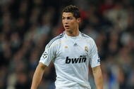 MADRID, SPAIN - NOVEMBER 25:  Cristiano Ronaldo of Real Madrid controls the ball during the Champions League group C match between Real Madrid and FC Zurich at the Estadio Santiago Bernabeu on November 25, 2009 in Madrid, Spain. Real Madrid won the match 1-0.  (Photo by Jasper Juinen/Getty Images)
