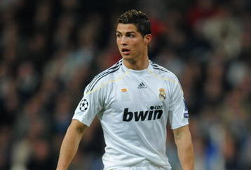 MADRID, SPAIN - NOVEMBER 25:  Cristiano Ronaldo of Real Madrid controls the ball during the Champions League group C match between Real Madrid and FC Zurich at the Estadio Santiago Bernabeu on November 25, 2009 in Madrid, Spain. Real Madrid won the match 1-0.  (Photo by Jasper Juinen/Getty Images)