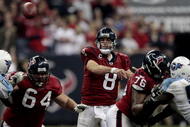 HOUSTON - NOVEMBER 23:  Quarterback Matt Schaub #8 of the Houston Texans passes over the middle as he is protected by guard Kasey Studdard #64 and tackle Duane Brown #76 at Reliant Stadium on November 23, 2009 in Houston, Texas.  (Photo by Bob Levey/Getty Images)