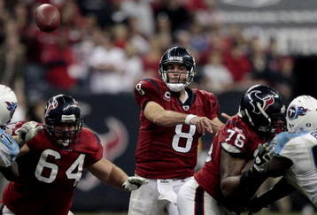 HOUSTON - NOVEMBER 23:  Quarterback Matt Schaub #8 of the Houston Texans passes over the middle as he is protected by guard Kasey Studdard #64 and tackle Duane Brown #76 at Reliant Stadium on November 23, 2009 in Houston, Texas.  (Photo by Bob Levey/Getty Images)