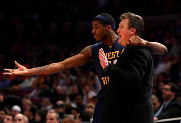 NEW YORK - MARCH 13: Head coach Bob Huggins and #3 Devin Ebanks of the West Virginia Mountaineers react on the sidelines during a game against the Syracuse Orange during the semifinal round of the Big East Tournament at Madison Square Garden on March 13, 2009 in New York City.  (Photo by Jim McIsaac/Getty Images)